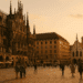 Marienplatz in Munich at golden hour with the Neues Rathaus and people enjoying a weekend in the city