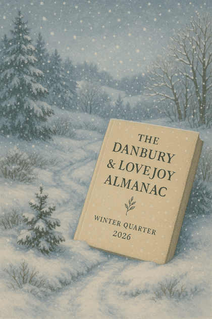The Danbury & Lovejoy Almanac Winter 2026 resting in a snowy landscape with fir trees and falling snowflakes