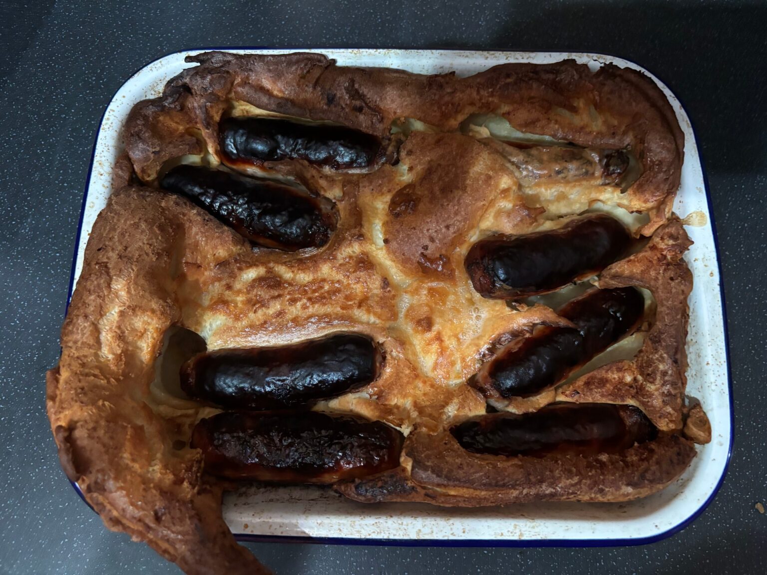 Toad in the Hole Recipe (UK) with Onion Gravy